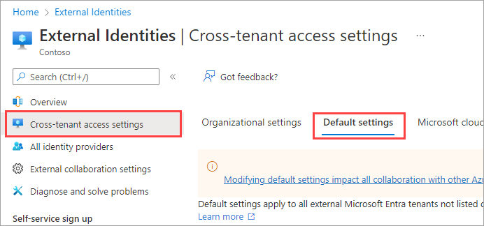 Screenshot that shows the tenant restrictions section on the tab for default settings.
