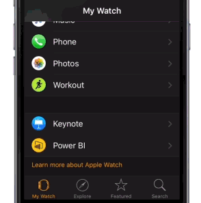 Screenshot showing an iPhone with the My Watch app open and the Power BI icon visible.